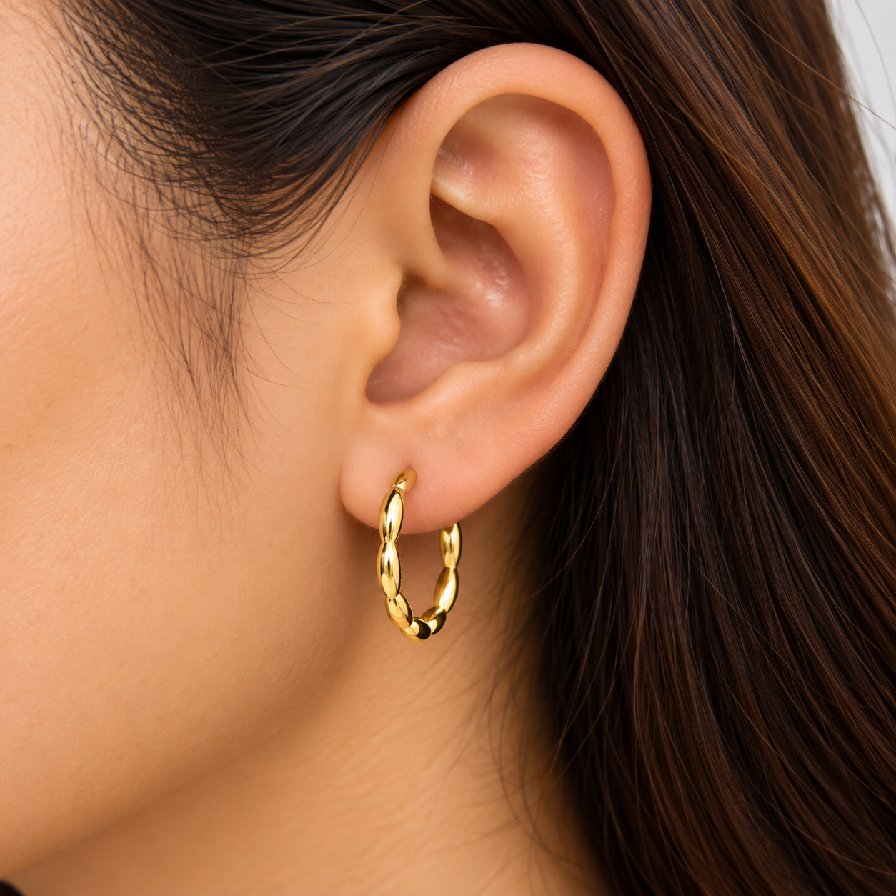 Sculpted Twist Gold Hoop Earring