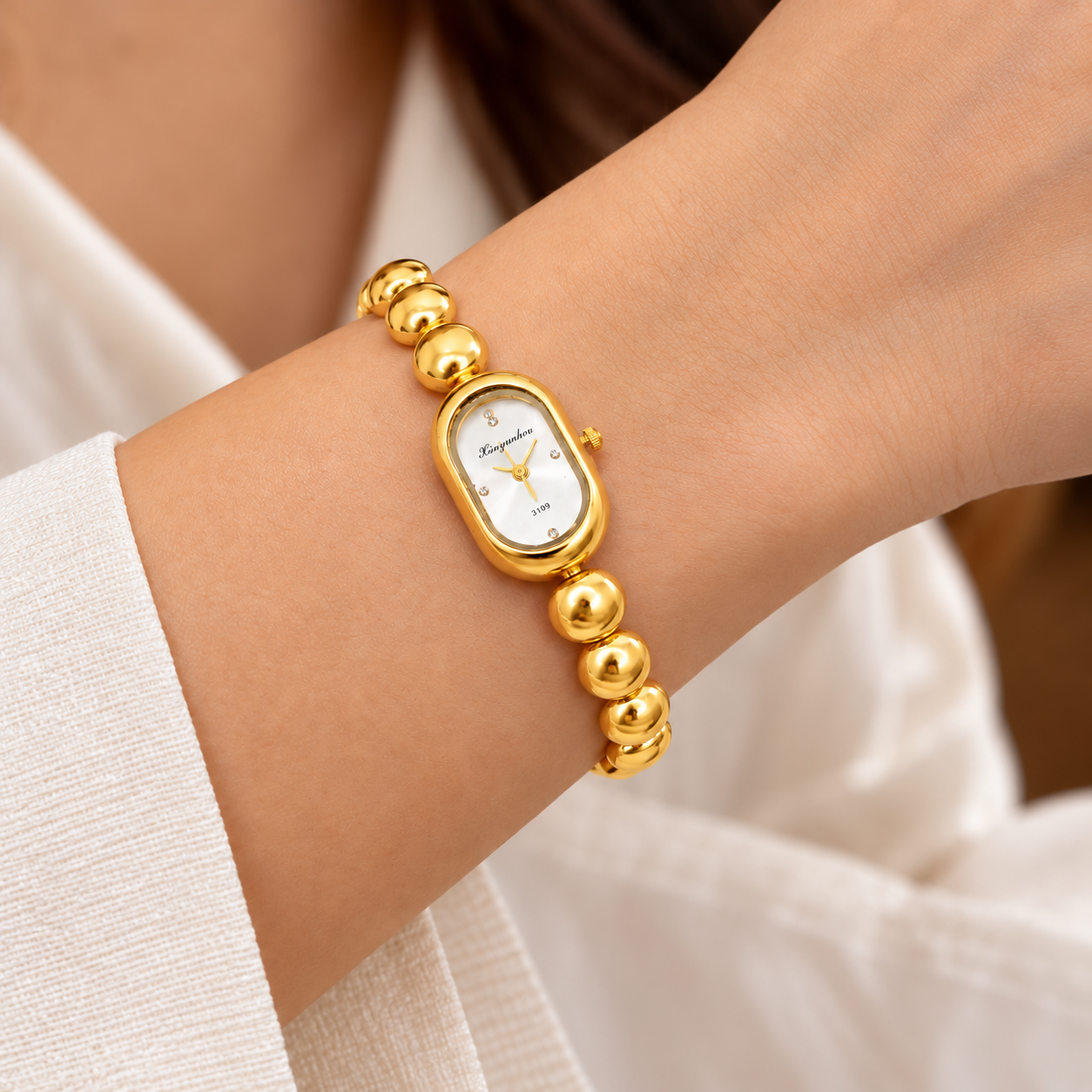 Golden Beaded Oval Dial Bracelet Watch