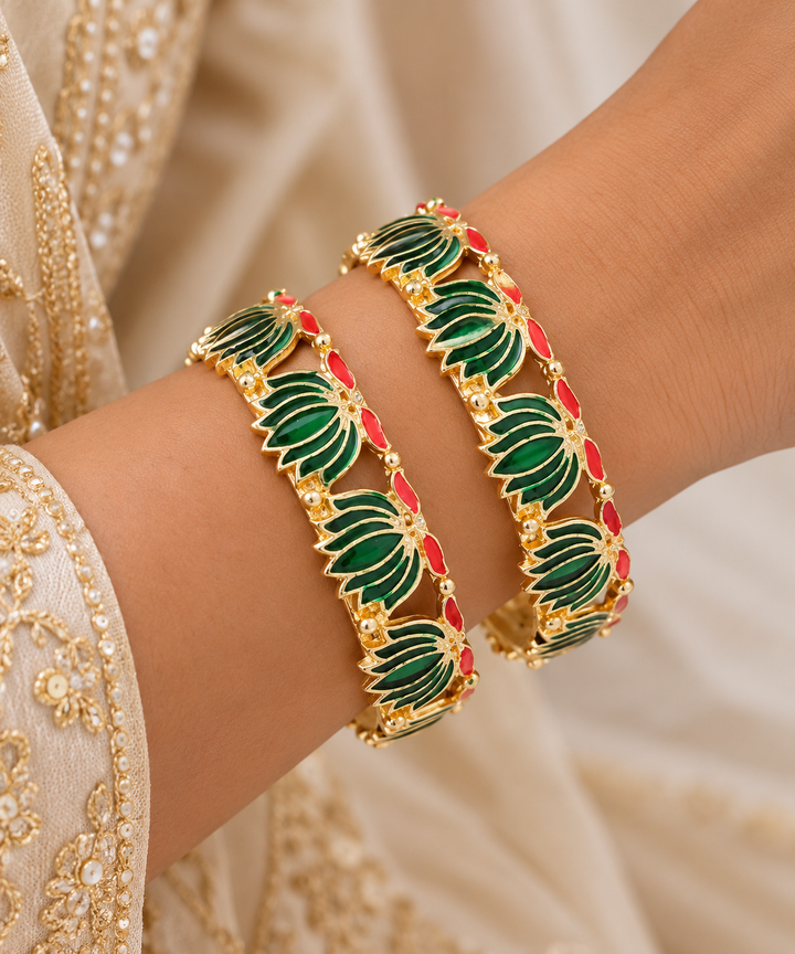 Ornate Gold Bangles with Green and Red Accents