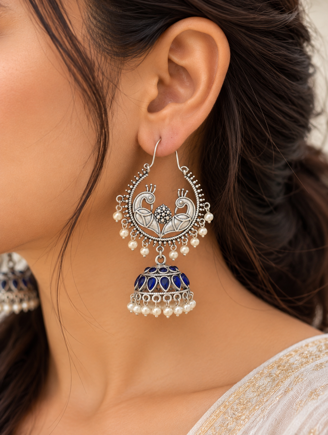 Ornate Silver Peacock Jhumka Earrings