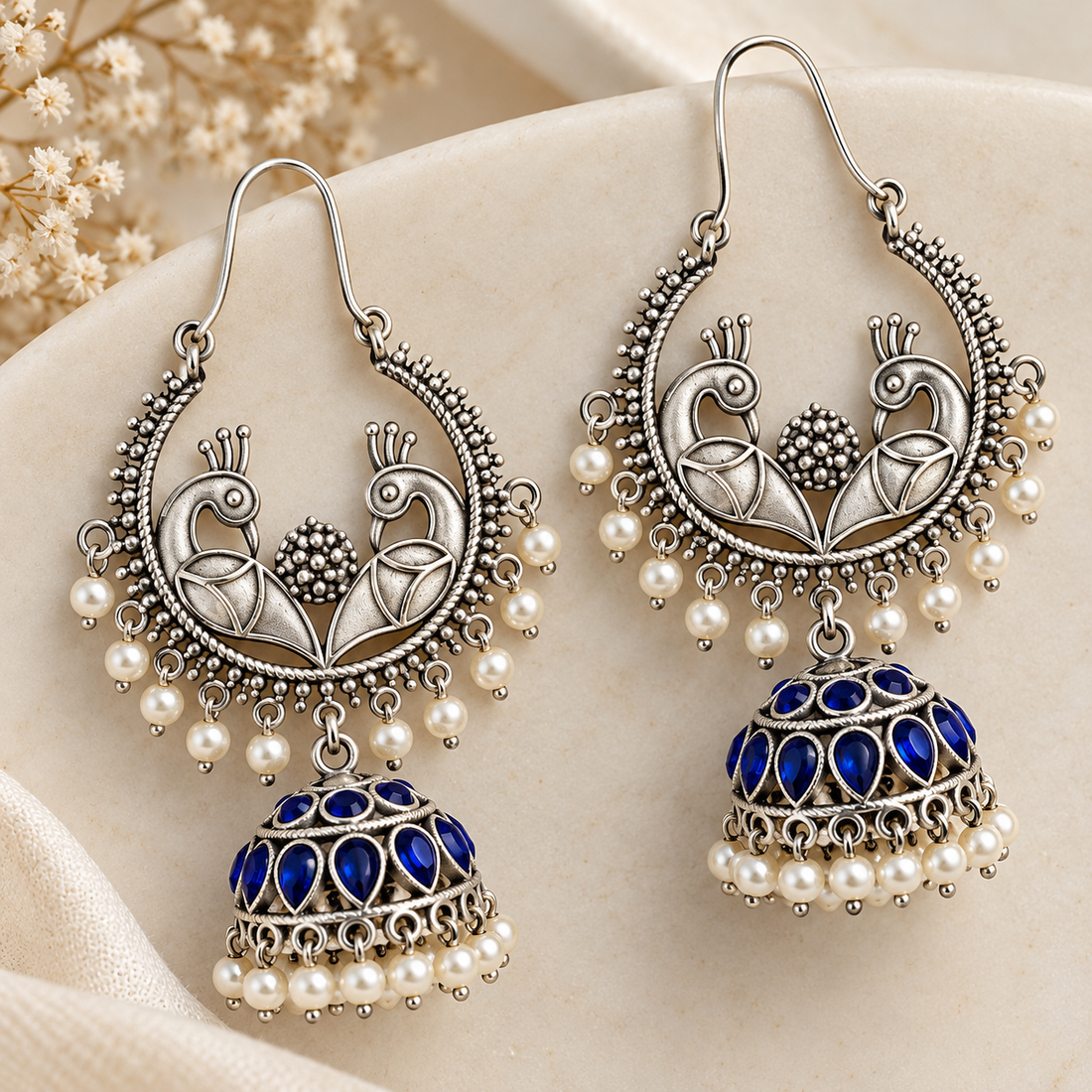 Ornate Silver Peacock Jhumka Earrings